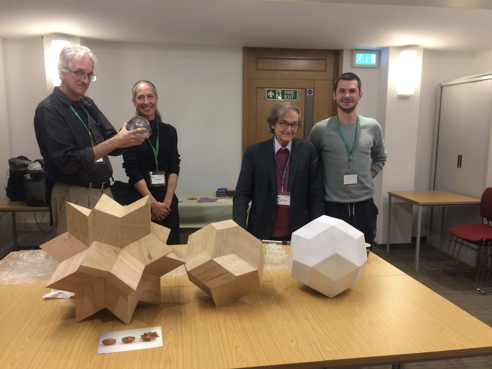 Prof. Joshua Socolar, Dr Shelley James, Sir Roger Penrose and mathematician at ICMS Edinburgh with works by Dominic Hopkinson (2018). Photo: Dominic Hopkinson.